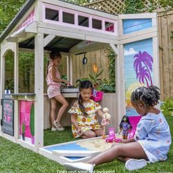 KidKraft Barbie™ Seaside Wooden Outdoor Playhouse with Attachable Doll Table and Chairs