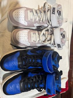 Two Pairs Nike High-Top Sneakers