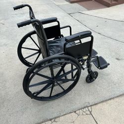 18 Inches Wide Wheelchair In Excellent Condition Easy To Fold 