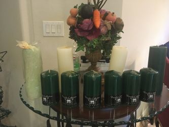 10 Xmas candles ( 6 new small) + other Xmas items& decorative baskets. Available only till December 18