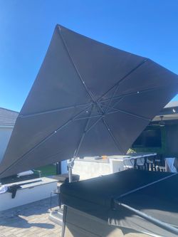 9’x12’ umbrella with weighted stand
