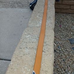 A Prada And Louis Vuitton Wallet And Some Ray-Ban Glasses