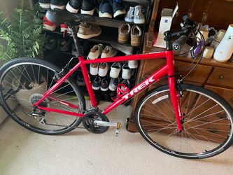 Trek red men’s street bicycle