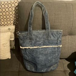 Denim Textured Tote Bag with fringe. 