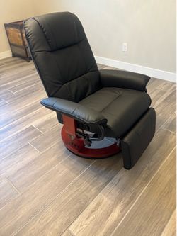 Brand new black, vegan leather reclining chair, never used