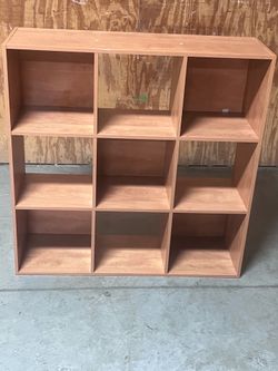 13" 9 Cube Organizer - Decorative Bookshelf, Cubby Storage solid heavy and sturdy. Used in good condition with some cosmetic blemishes. These blemishe