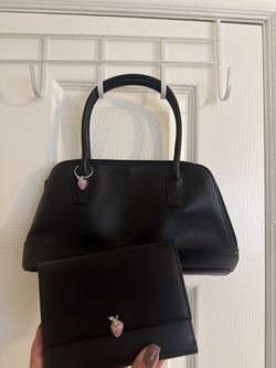 Mini black purse with strawberry accent