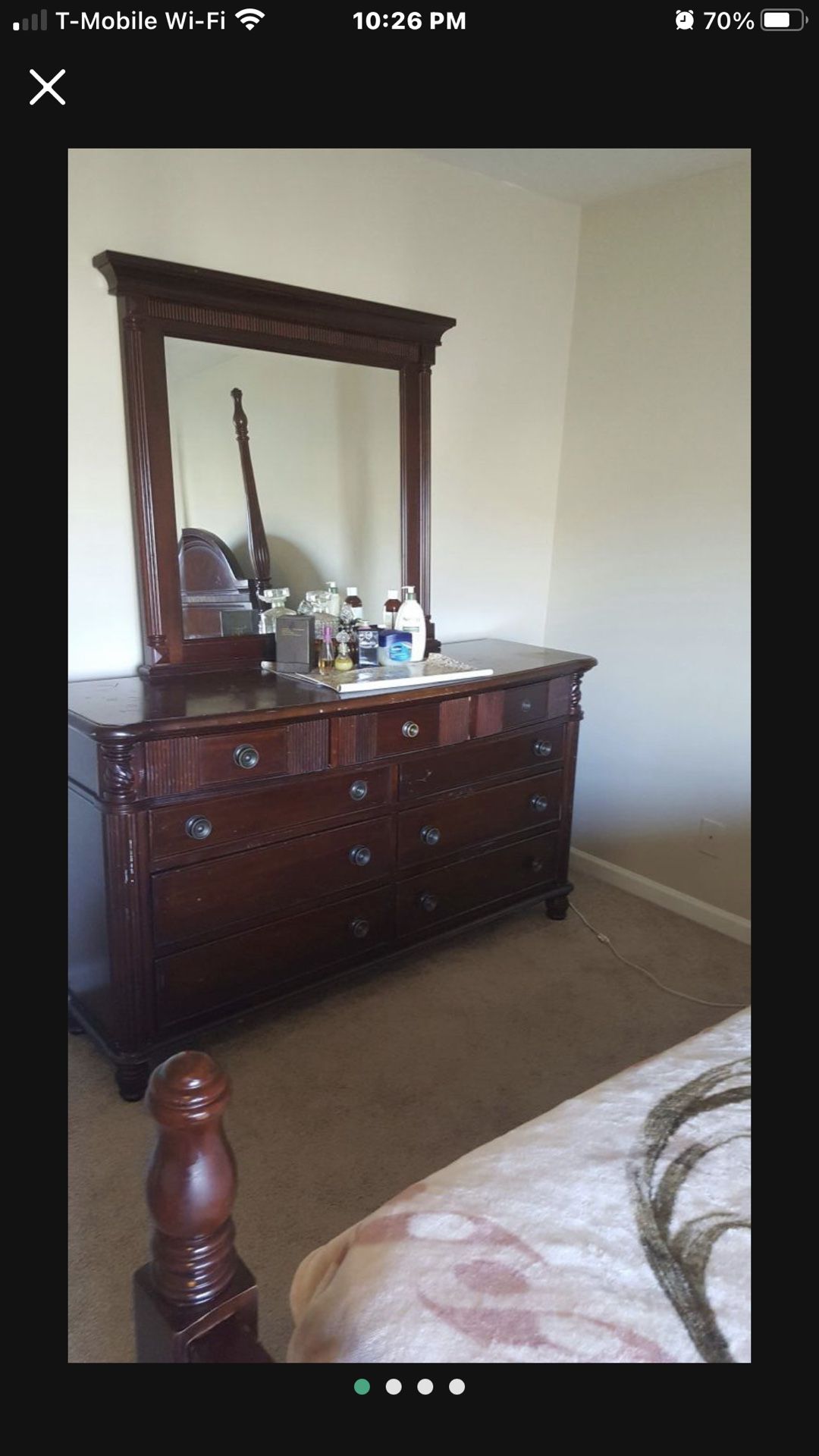 Queen bed, dresser with mirror and night stand but no mattress. Few scratches