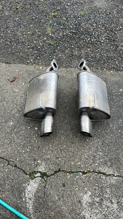 Two Subaru mufflers