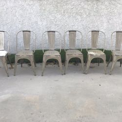 6 Metal Stacking Chairs