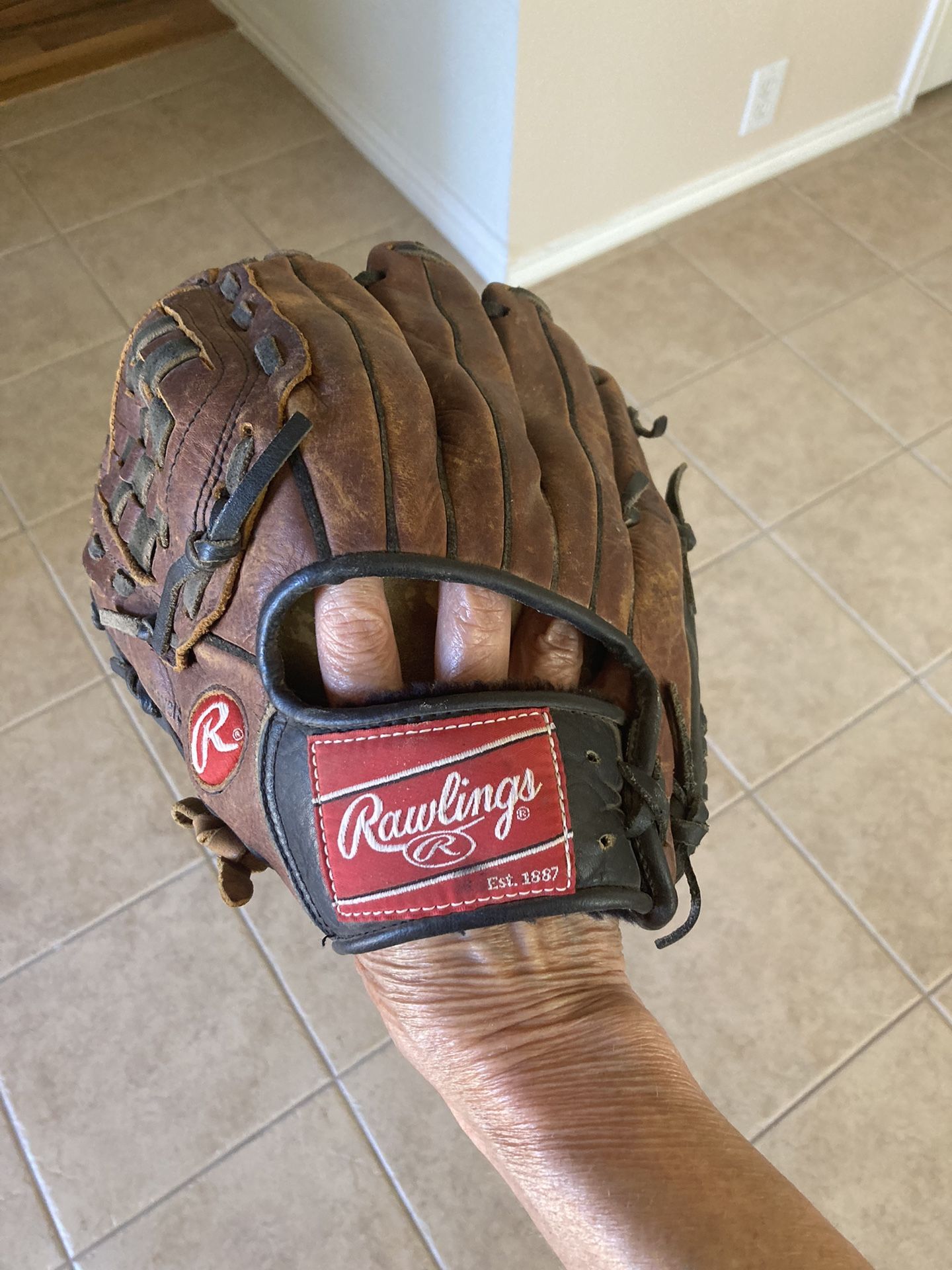 Used Rawlings Youth Left handed Person Baseball Glove