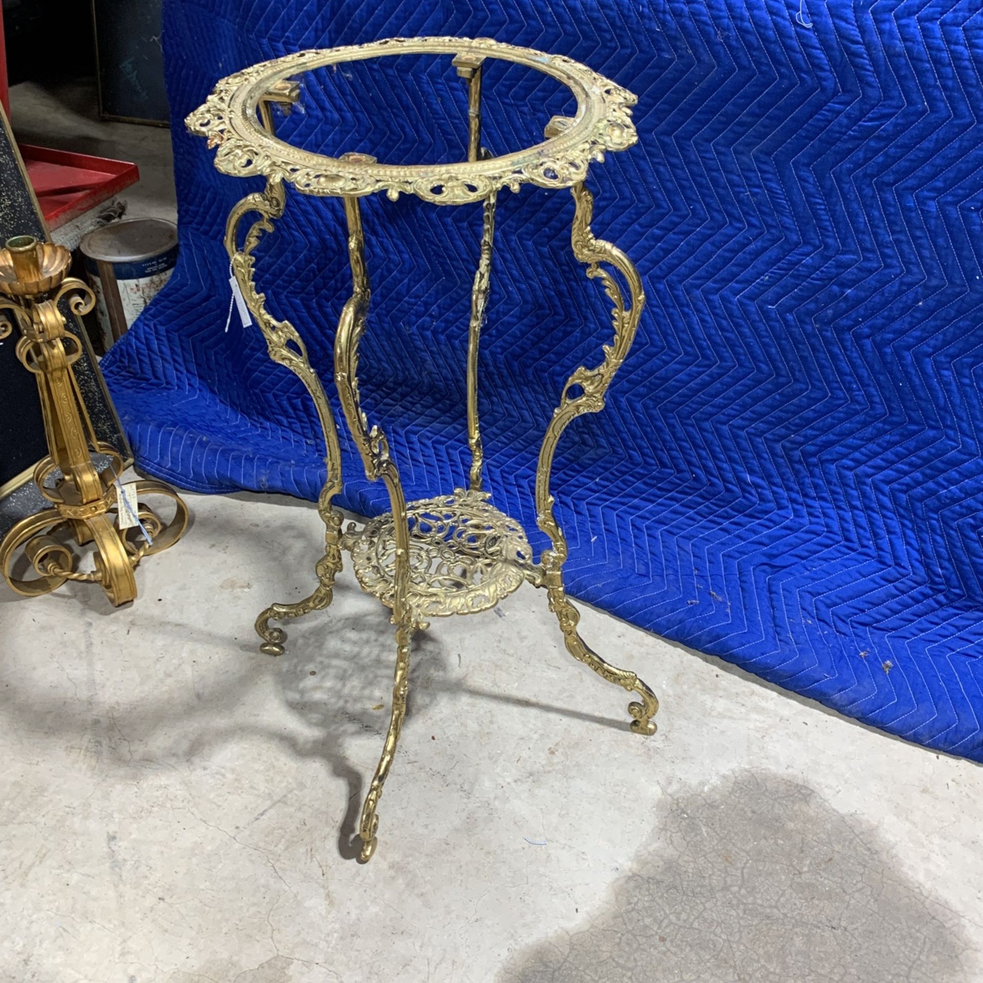 Old ornate brass stand