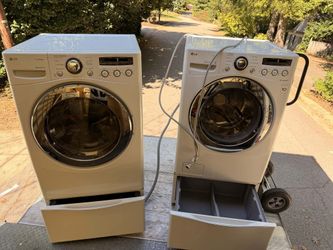 LG Front-Load Washer and Dryer Set with Pedestals