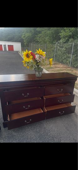 Modern solid wood long dresser. Drawers sliding smoothly