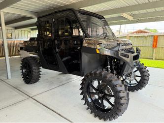 System 3 XT400W 37x12-24 tires on Frontline 556 gloss black wheels (24x9) 5x4.5 4/156 adapters