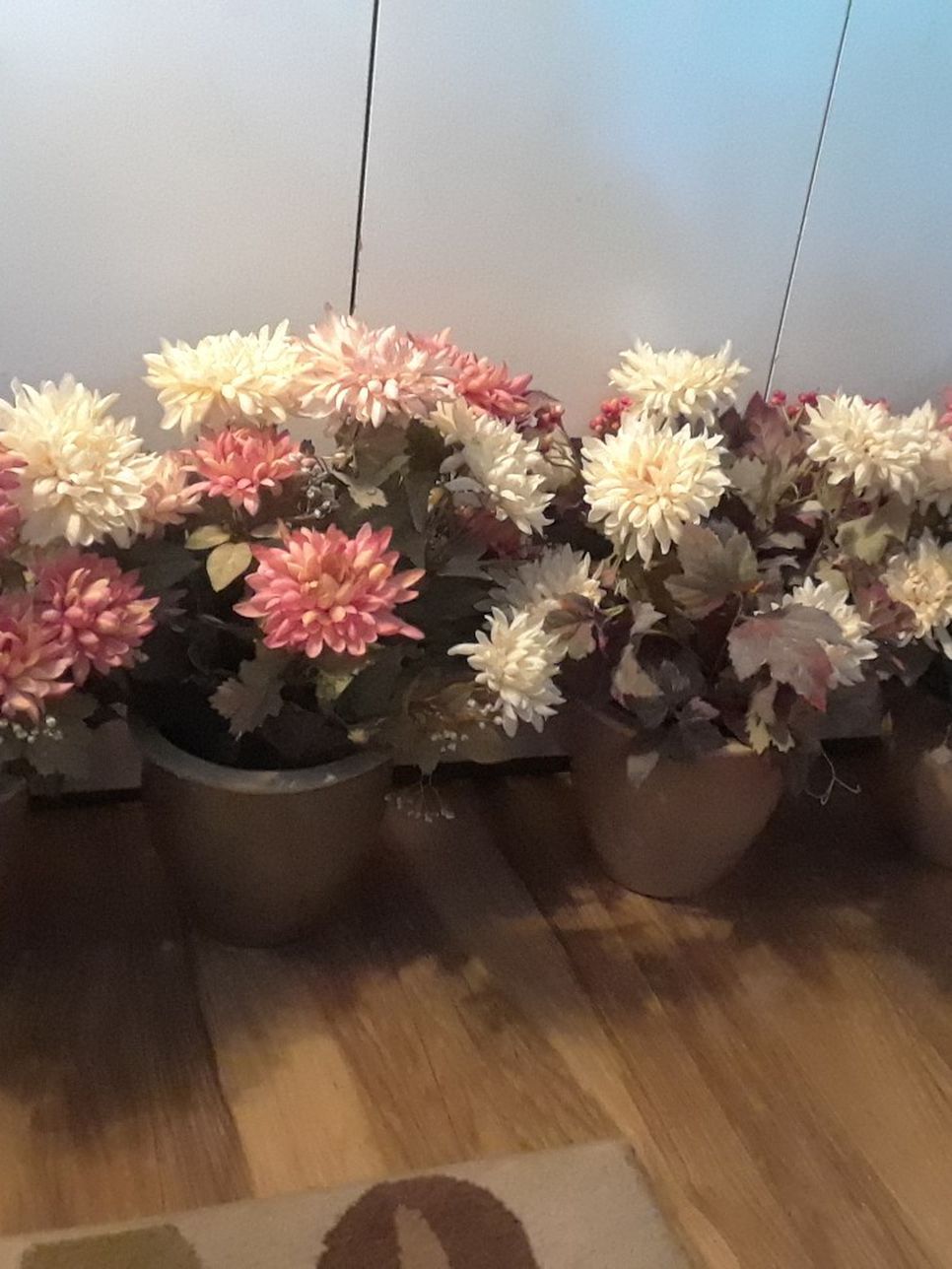Potted artificial flowers