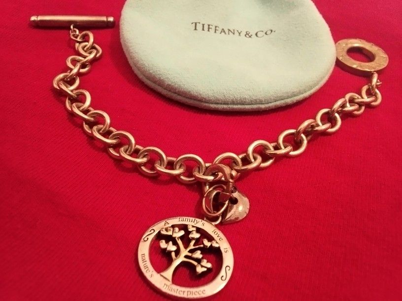 Tiffany & Co ..Charm Bracelet W/ Charm Ladybug,Charm snowflake, Charm Lantern And Charm Candle All Tiffany & Co