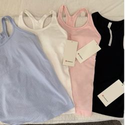 4 Lululemon Tanks. Sz 4