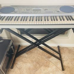 Yamaha EZ300 61-Key Portable Keyboard with Lighted Keys and PA130 Power Adapter