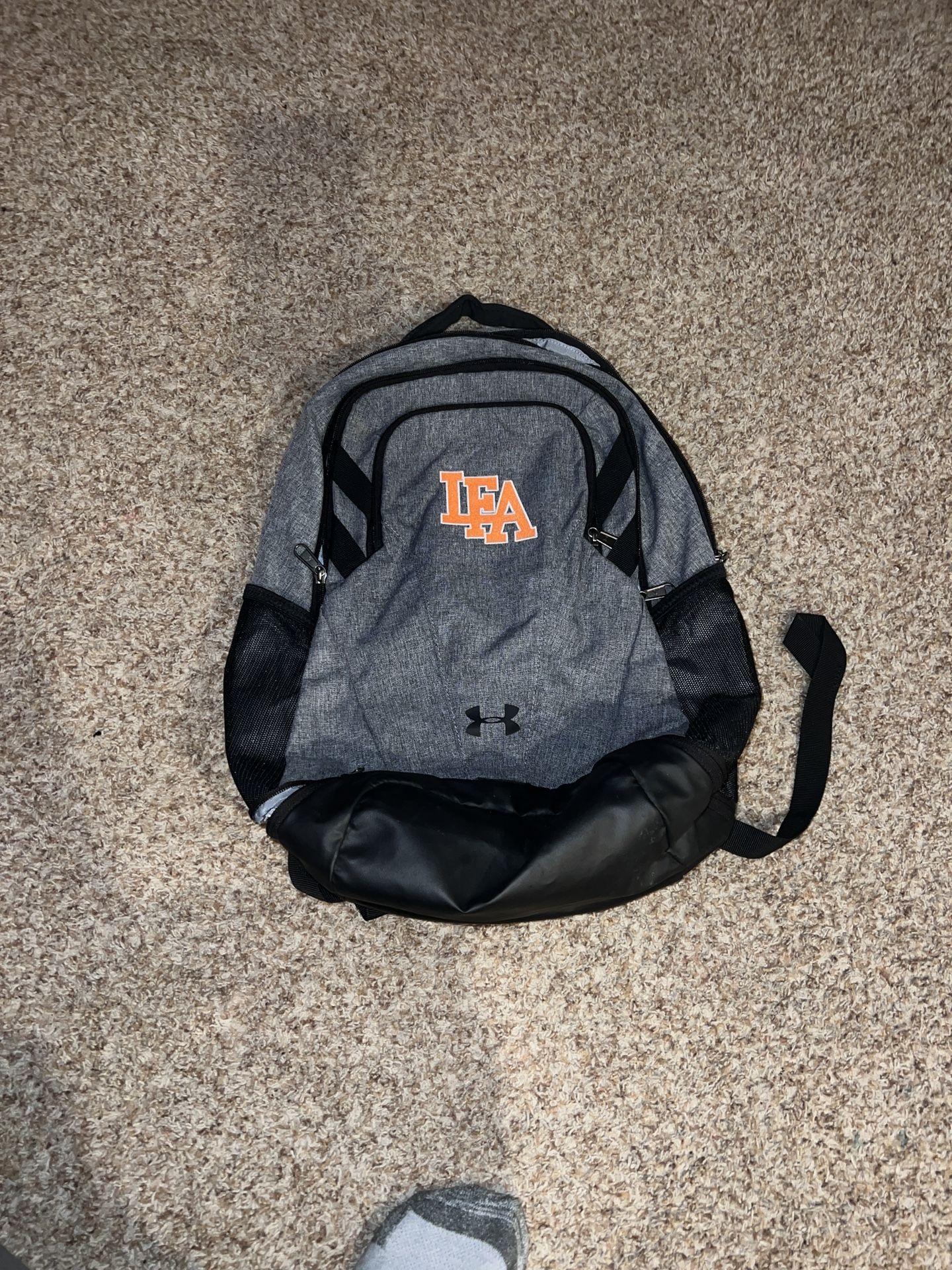 Under Armour Gray and Black Backpack with lake forest academy Logo
