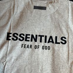 Grey essentials t shirt never used