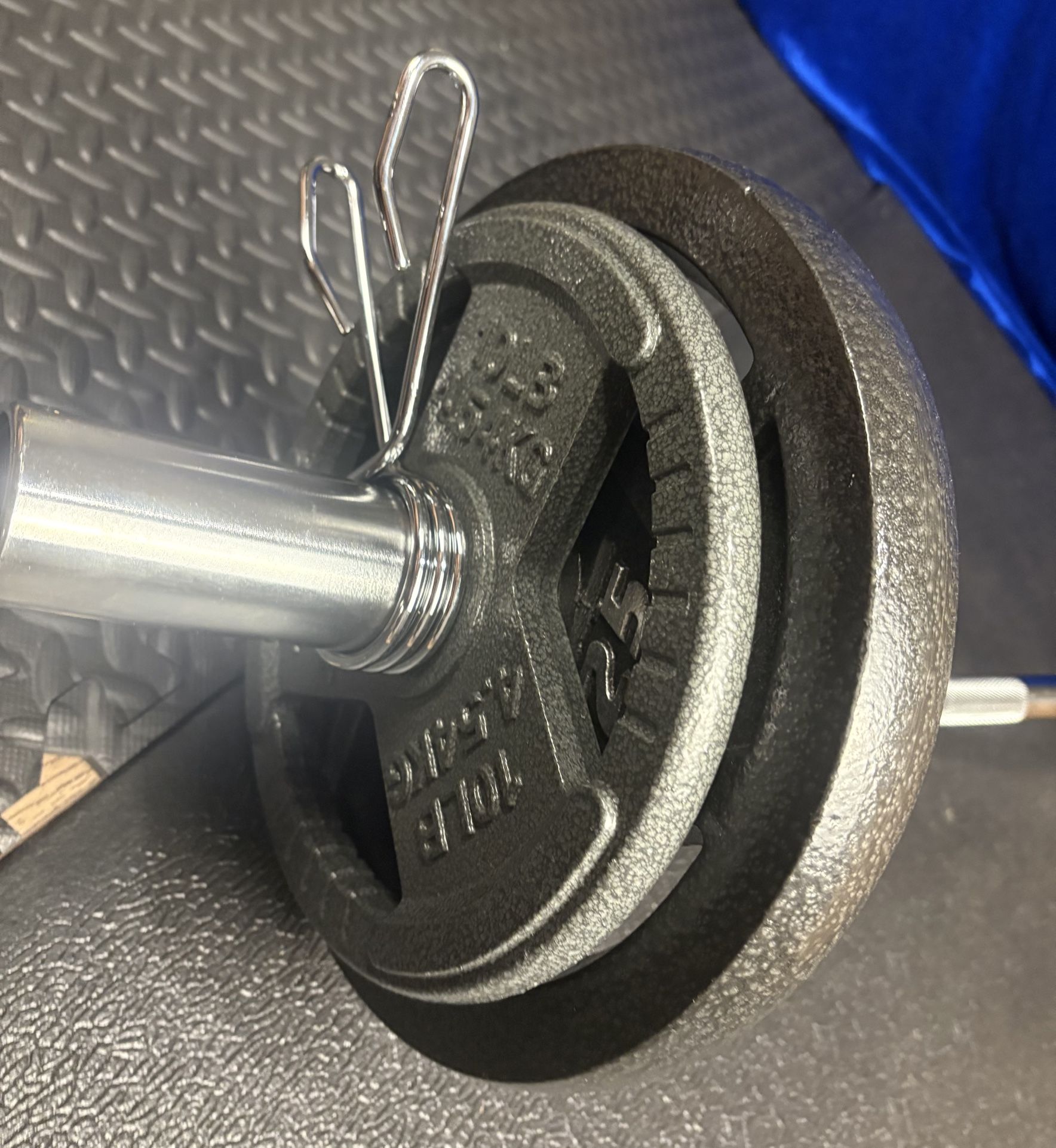 Brand New Olympic Weightlifting Equipment; Curl Bar with Pair of 25s and Pair of 10s. 90 # Brute.