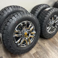 NEW 20 inch Gm style chrome wheels wrapped in LT295/65R20 tires same as a 35.