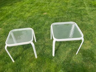 Two White Metal Glass Top Outdoor Tables