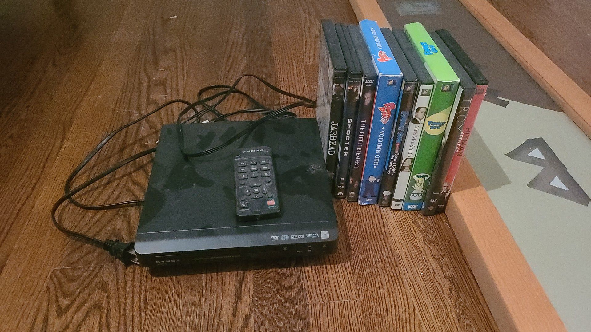 Newish DVD player and 7 DVDs and 2 Box Sets