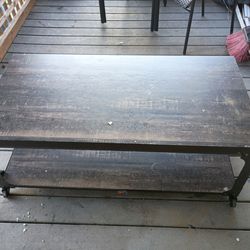 Long black table with wheels