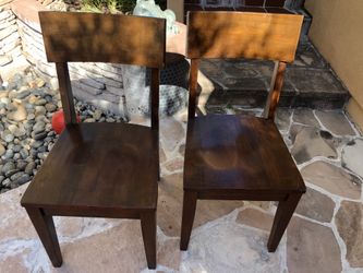 Pair of solid wood chairs