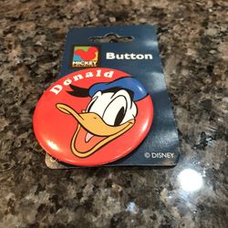 Vintage Disney Donald Duck Pin Back Pin.  Round shape. From 1985.  The round pin is 2 1/4 inches wide.  Brand new never removed from original packagin