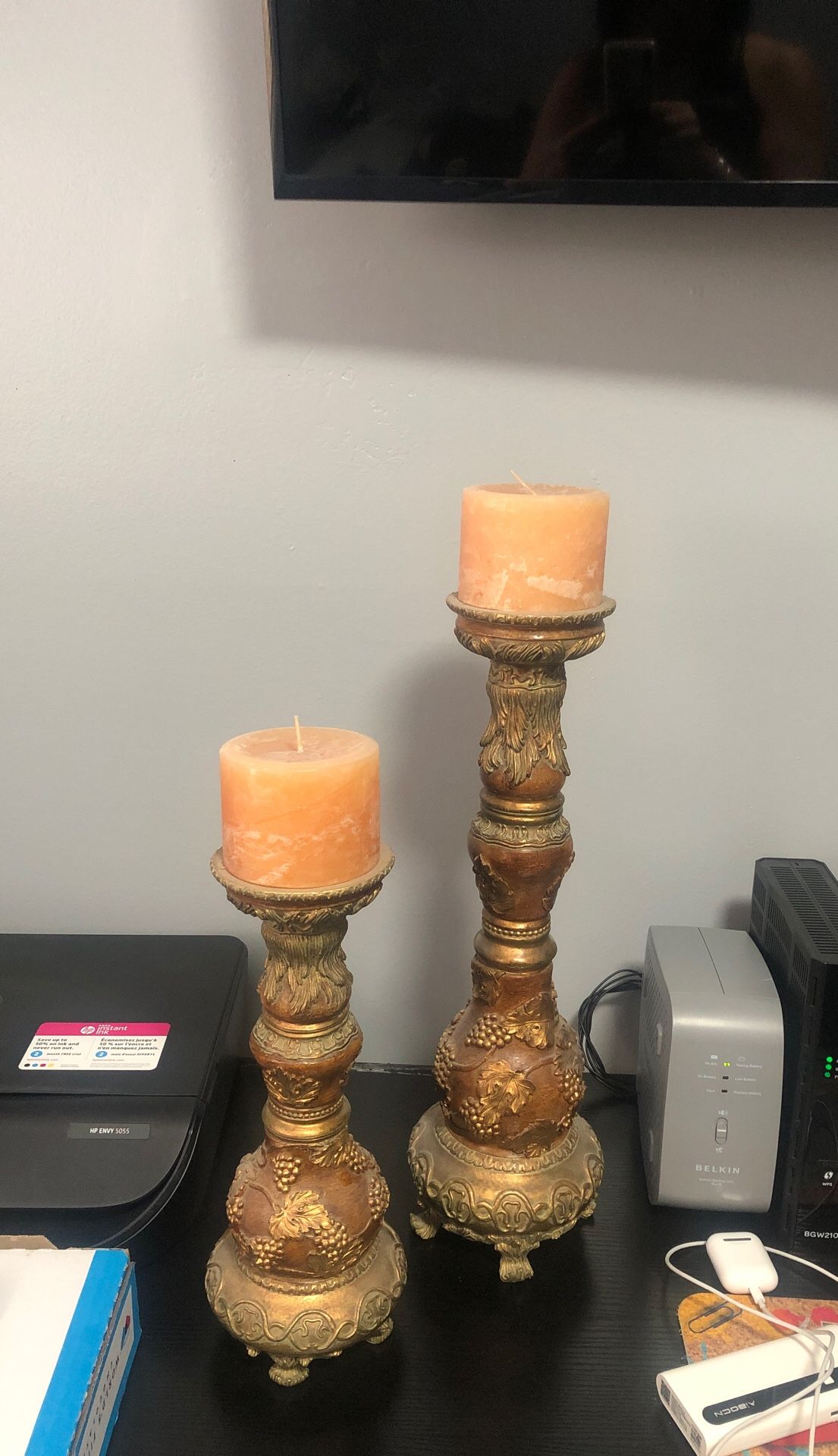 Candle holders with candles.