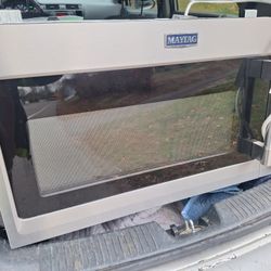 MAYTAG STAINLESS STEEL OVER THE RANGE MICROWAVE. 