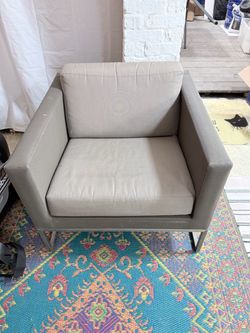Three modern grey outdoor chairs + 1 ottoman