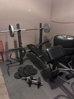 Like used Bench with weights Bar and 2 dumbbells