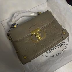 brown and gold VAFIVTNO bag