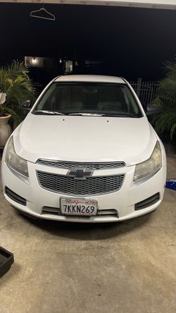 White 2014 Chevy cruise LD