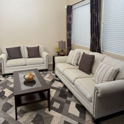 Sofa Set (Includes 3 Coffee Tables, Rug, Two Lamps and Curtains) 