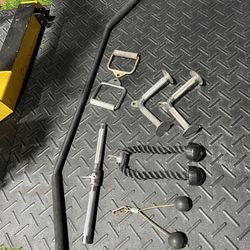  2 V - Bars  1 Rope  1 Lateral pulldown bar Small Curl Bar Etc.