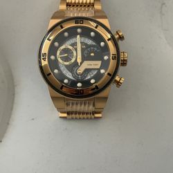 Invicta Gold and Black Face watch