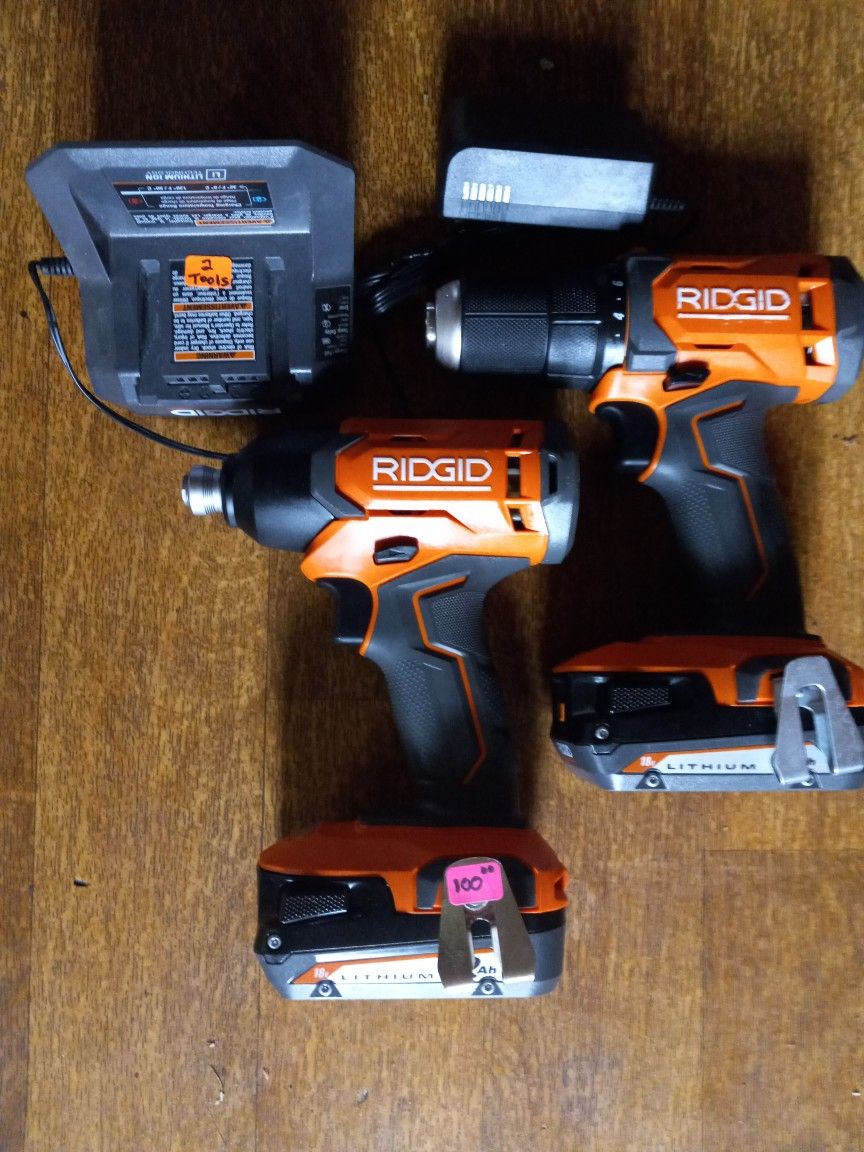 Ridgid 18 Volt Drill And Impact Kit With Batteries Charger And Carry Bag