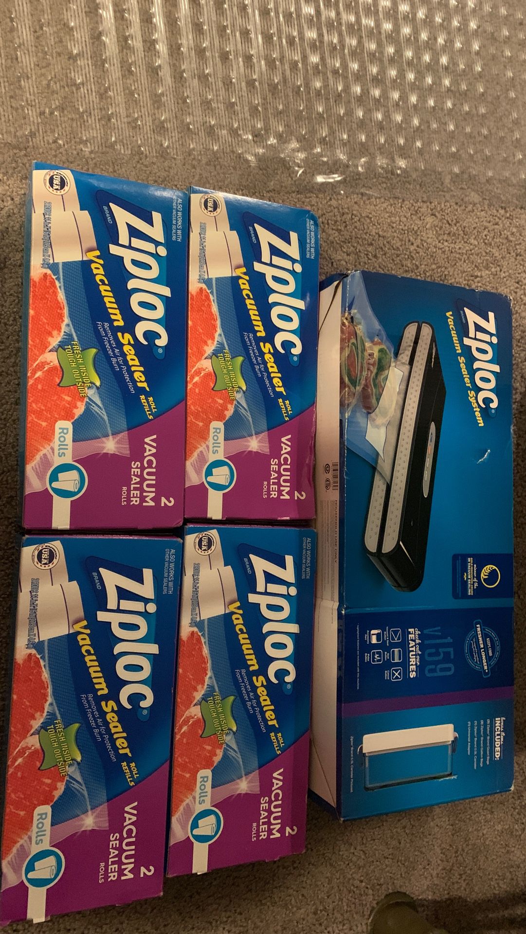Ziplock vacuum sealer system with 4 packs of the roll refills