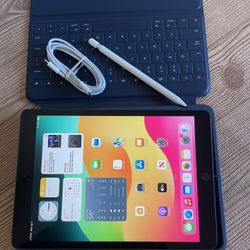 Apple iPad 7th Generation 128GB With Logitech Keyboard and Pencil 