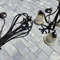 Chandelier light fixture Entryway dining

From non smoking pet free home. List price is for both. Great condition. Selling other chandeliers as well.