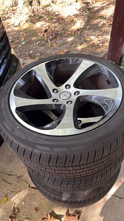 18x8.5 Shift Strut Gloss Machined Rims. 4 235/45R18XL Atlas tires.