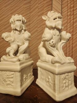Pair of White Ceramic Foo Dog Statues