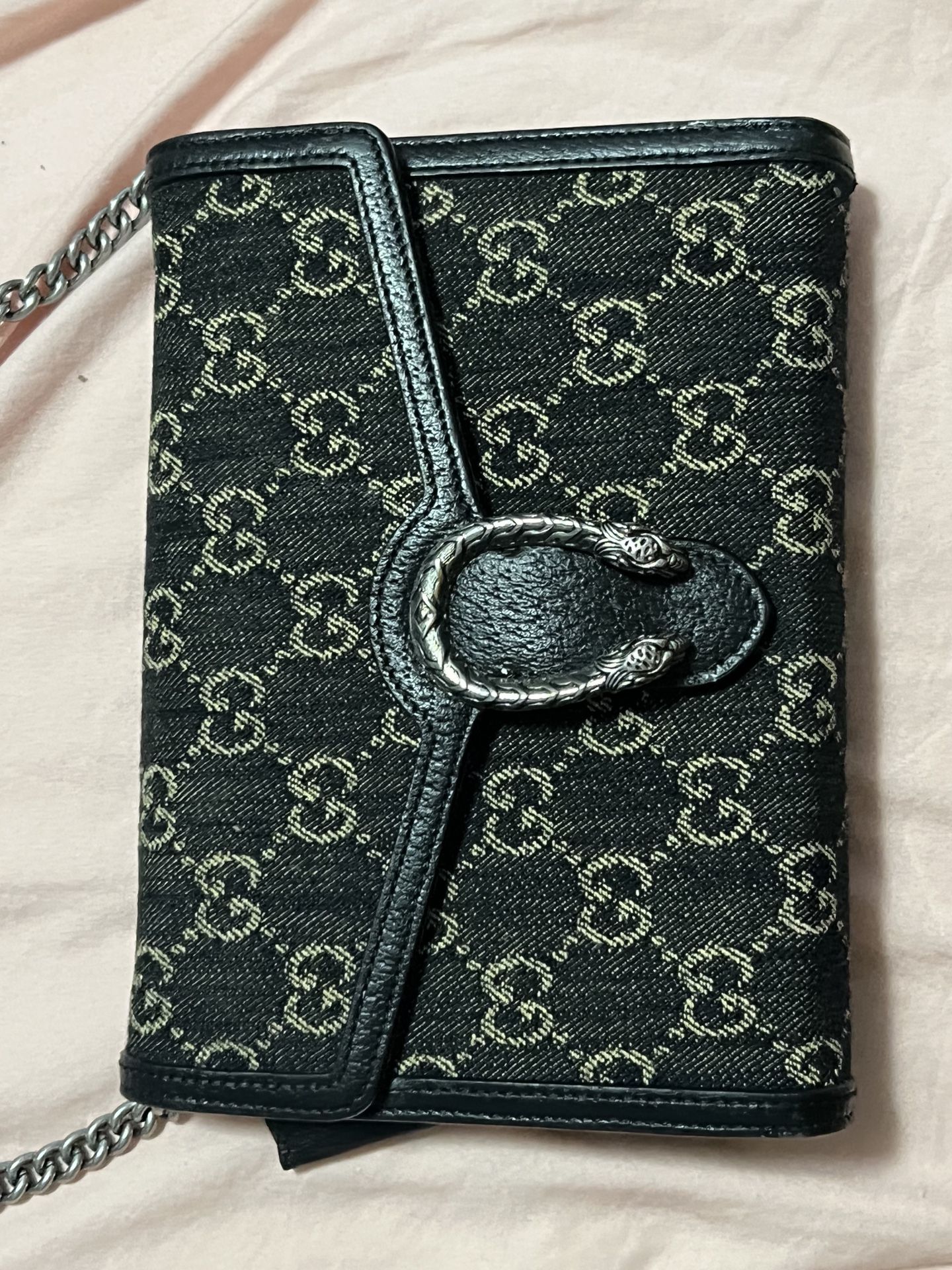 Guccis Cross Over Bag