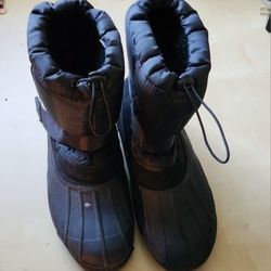 Boots size 9 Adult Black with velcro strap. Preowned in good condition.