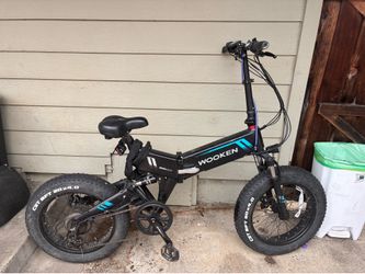 WOOKEN Folding Electric Fat Tire Bike 20x4.0